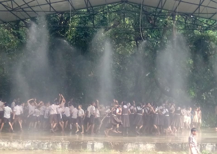 childrens-enjoying-rain-dance-at-heera-farm